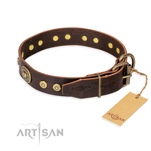 Full grain leather dog collar made of gentle to touch material with corrosion resistant embellishments