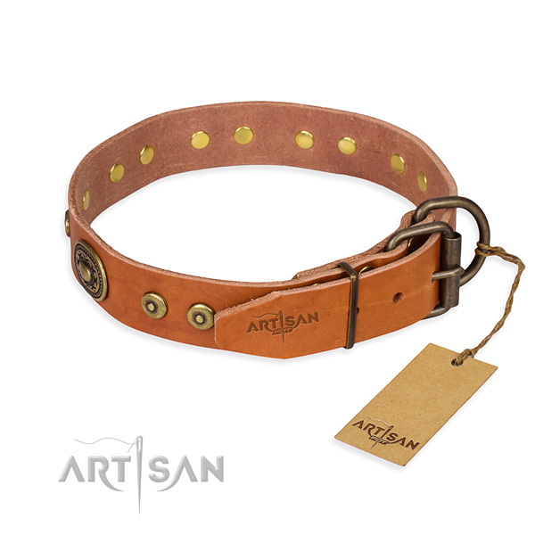 Natural genuine leather dog collar made of soft to touch material with durable adornments